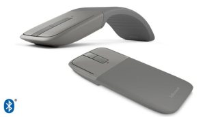 Arc Touch Bluetooth Mouse shown on (curved) and off (pressed flat)